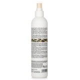 Leave-in conditioner for curly hair with organic oils, milk proteins, and quinoa; enhances bounce and manageability.