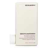 Smoothing shampoo for thick, coarse hair with Monoi Oil and Murumuru Butter, reducing frizz and enhancing shine.