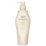 Shiseido Sublimic Aqua Intensive Shampoo 500ml revitalizes damaged hair, providing hydration and shine with a floral scent.