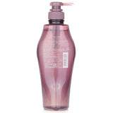 Shiseido Sublimic Luminoforce Shampoo in a 500ml bottle, designed for colored hair, enhances shine and repairs damage.