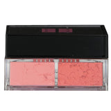 Givenchy Prisme Libre Blush #3 Voile Coral, a 4-in-1 loose powder for illuminating and sculpting cheeks with vibrant color.