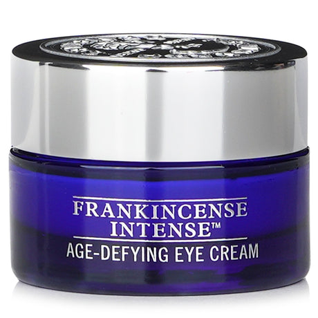 Neal's Yard Frankincense Age-Defying Eye Cream in 15g jar, enriched with organic ingredients to reduce puffiness and wrinkles.