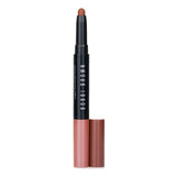 Dual-ended cream shadow stick in Rusted Pink and Cinnamon; long-lasting, waterproof, and easy application for versatile eye looks.