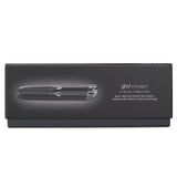 GHD Unplugged cordless hair straightener in black, features advanced technology for sleek styling anytime, anywhere.