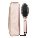 GHD Glide Smoothing Hot Brush in bronze, featuring ceramic technology for frizz-free, salon-quality styling at home.