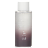Hydrating toner with fermented black rice extract, enhancing skin's elasticity and absorption of skincare products.