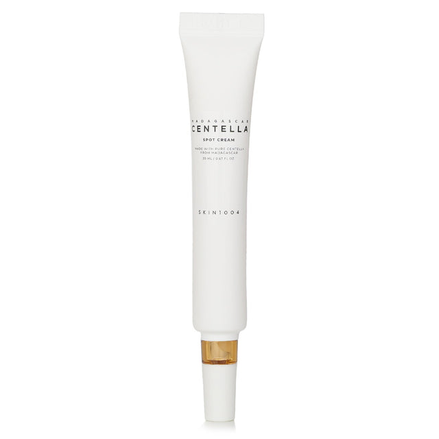Skin1004 Madagascar Centella Spot Cream in 20ml, a soothing acne treatment with Centella, Niacinamide, and nourishing oils.