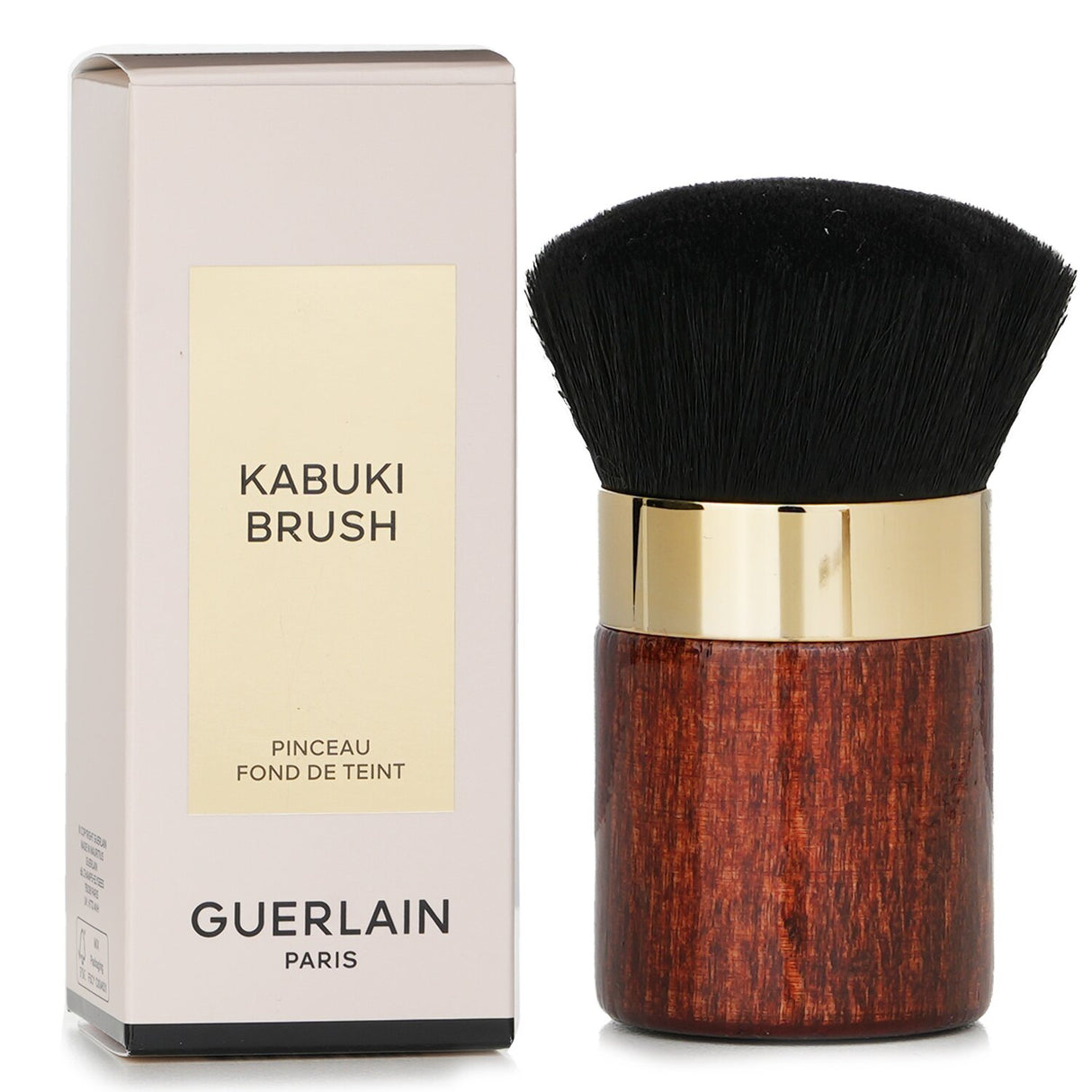 Guerlain Kabuki Brush for flawless foundation application, featuring soft synthetic bristles and a short handle for precision.