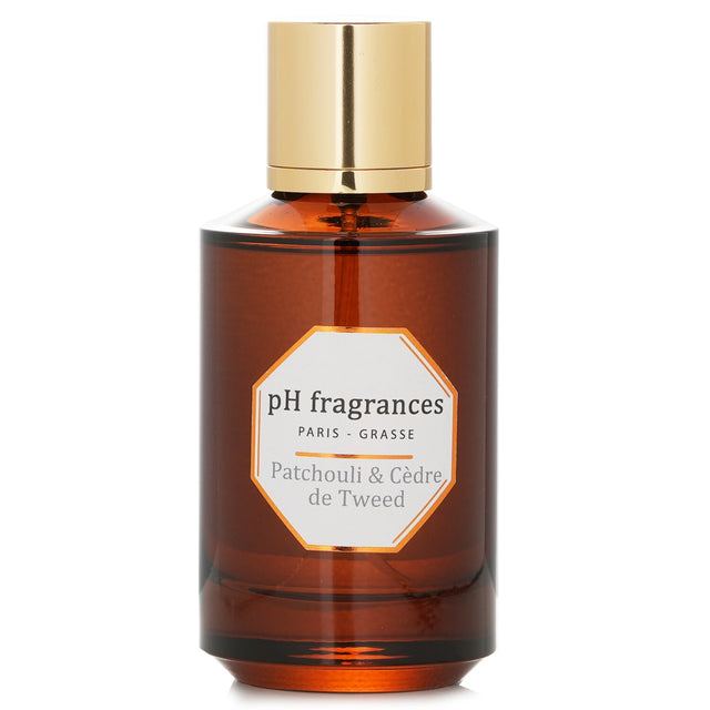 A 100ml bottle of pH Fragrances Eau De Parfum featuring earthy patchouli and fresh cedar for a sophisticated scent.