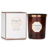 Luxurious hand-poured scented candle in Vetiver & Santal De Cuir, 180g, enriching any space with earthy and woody aromas.