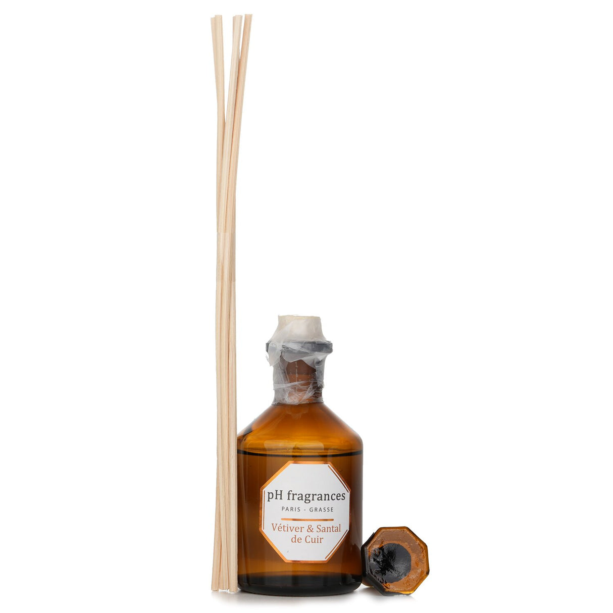 Home perfume diffuser featuring Vetiver & Sandal of Leather scent in stylish packaging, perfect for enhancing any room.