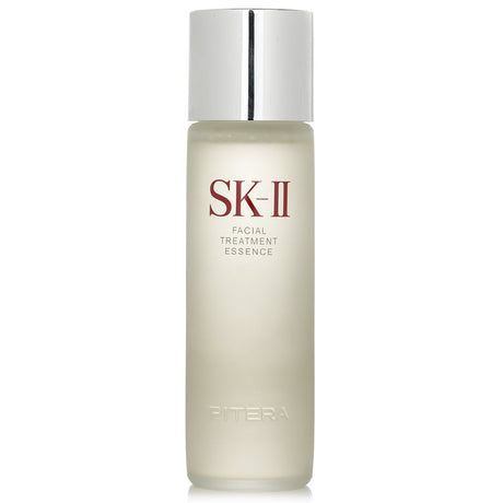 Travel-sized SK II Facial Treatment Essence, 230ml, revitalizes skin with Pitera™ for hydration, radiance, and smoothness.