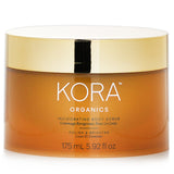 Kora Organics Invigorating Body Scrub in 175ml, revitalizes skin with turmeric, rosehip, and peppermint for a smooth, glowing finish.