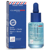 Clarins Men Shave + Beard Oil in a 30ml bottle, designed to soften beards and hydrate skin for a smooth grooming experience.