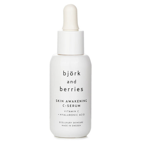 Vibrant bottling of Bjork & Berries Skin Awakening C Serum, featuring 98% natural ingredients for radiant, hydrated skin.