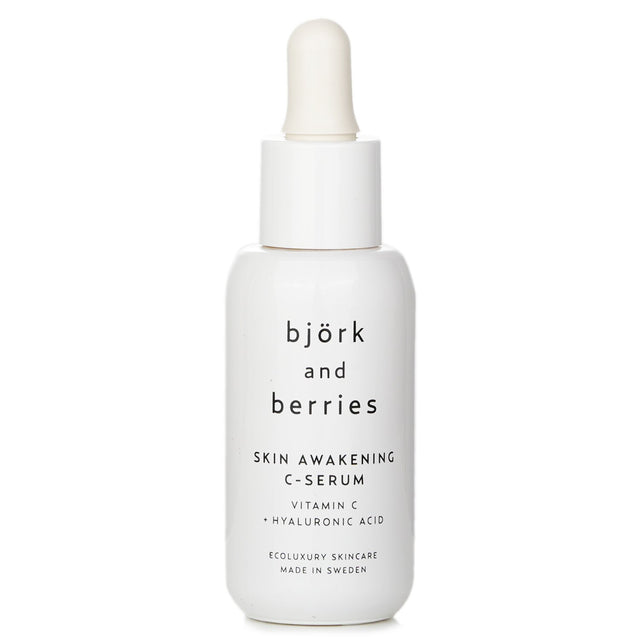 Vibrant bottling of Bjork & Berries Skin Awakening C Serum, featuring 98% natural ingredients for radiant, hydrated skin.