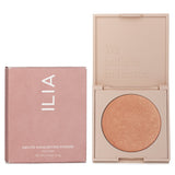 Rose gold highlighting powder from ILIA, finely milled for luminous glow, perfect for enhancing cheekbones and brow bones.