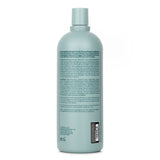 Aveda Scalp Solutions Balancing Shampoo 1000ml: vegan, sulfate-free shampoo for all hair types, enhancing scalp health with a refreshing citrus aroma.