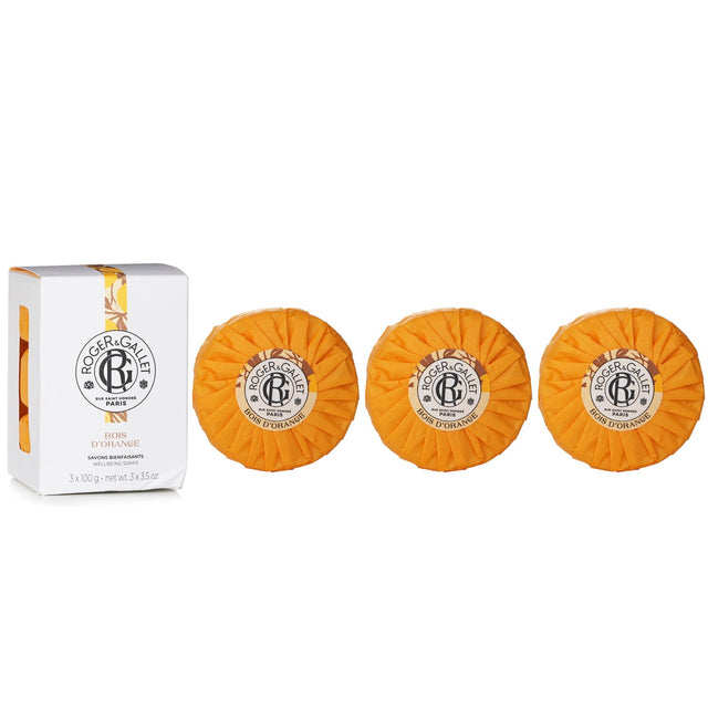 Luxurious Roger & Gallet Orange Wood Soaps Coffret with three 100g bars, infused with refreshing citrus aroma for soothing skincare.