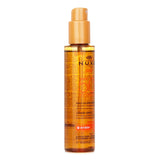 Nuxe Sun Tanning Oil SPF50 offers high protection and hydration for face and body, featuring a delightful summer scent.