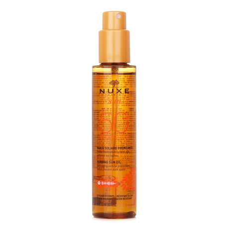 Nuxe Sun Tanning Oil SPF50 in a 150ml bottle, offering high protection and nourishing hydration for face and body under the sun.