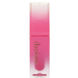 Hydrating oil-infused lip tint in #04 Plum Dew, providing vibrant color, shine, and a soft, plumping effect.