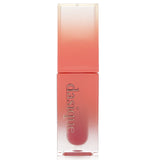 Hydrating oil-infused lip tint in #06 Rose Apple, delivering radiant color and a lightweight, non-sticky finish.