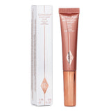 Charlotte Tilbury Beauty Light Wand High Blush in #Pinkgasm, a 12ml liquid blush for a dewy, radiant finish with easy application.