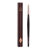 Charlotte Tilbury Eye Liner Brush in rose gold, perfect for precise smoky eye application and subtle color along the lash line.