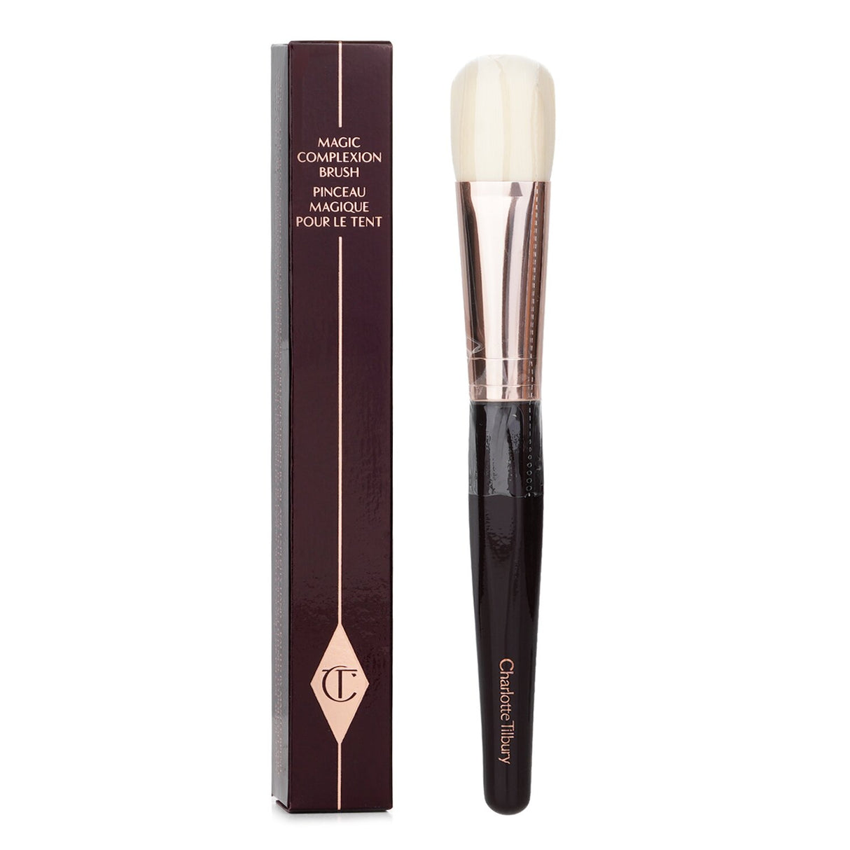 Charlotte Tilbury Magic Complexion Brush with flat head and synthetic bristles for flawless foundation application.