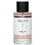 A 100ml bottle of HEELEY Hippie Rose Eau De Parfum, featuring floral and earthy notes for a free-spirited essence.