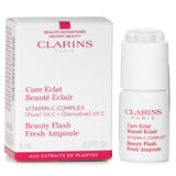 Clarins Beauty Flash Fresh Ampoule with 15% Vitamin C boosts radiance, evens skin tone, and suits all skin types.