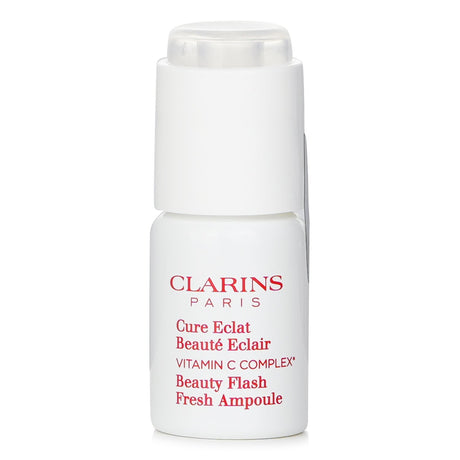 Clarins Beauty Flash Fresh Ampoule: 8ml Vitamin C treatment for radiant, even skin with 15% concentrated complex and Acerola extract.