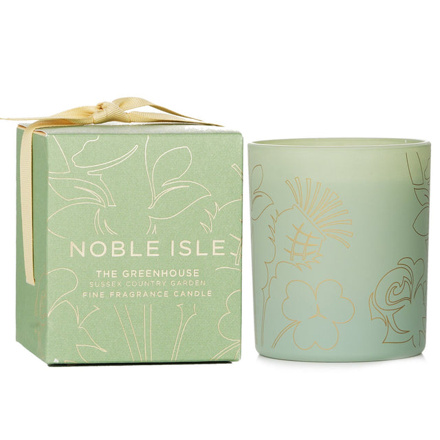 Noble Isle The Greenhouse candle, 200g, featuring vibrant greenery notes for an elegant, serene atmosphere.