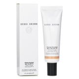 Lightweight tinted moisturizer with SPF 15, enriched with vitamins for hydration and sheer, natural coverage.