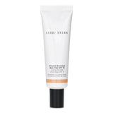 Lightweight tinted moisturizer with SPF 15, enriched with vitamins for fresh, natural coverage, ideal for all skin types.