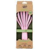 Eco-friendly Wet Brush in pink for curly hair with IntelliFlex bristles, designed to detangle gently and reduce breakage.