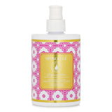 Luxurious Spongelle Hand & Body Lotion in Bulgarian Rose, hydrating formula with natural oils, elegant bottle design.