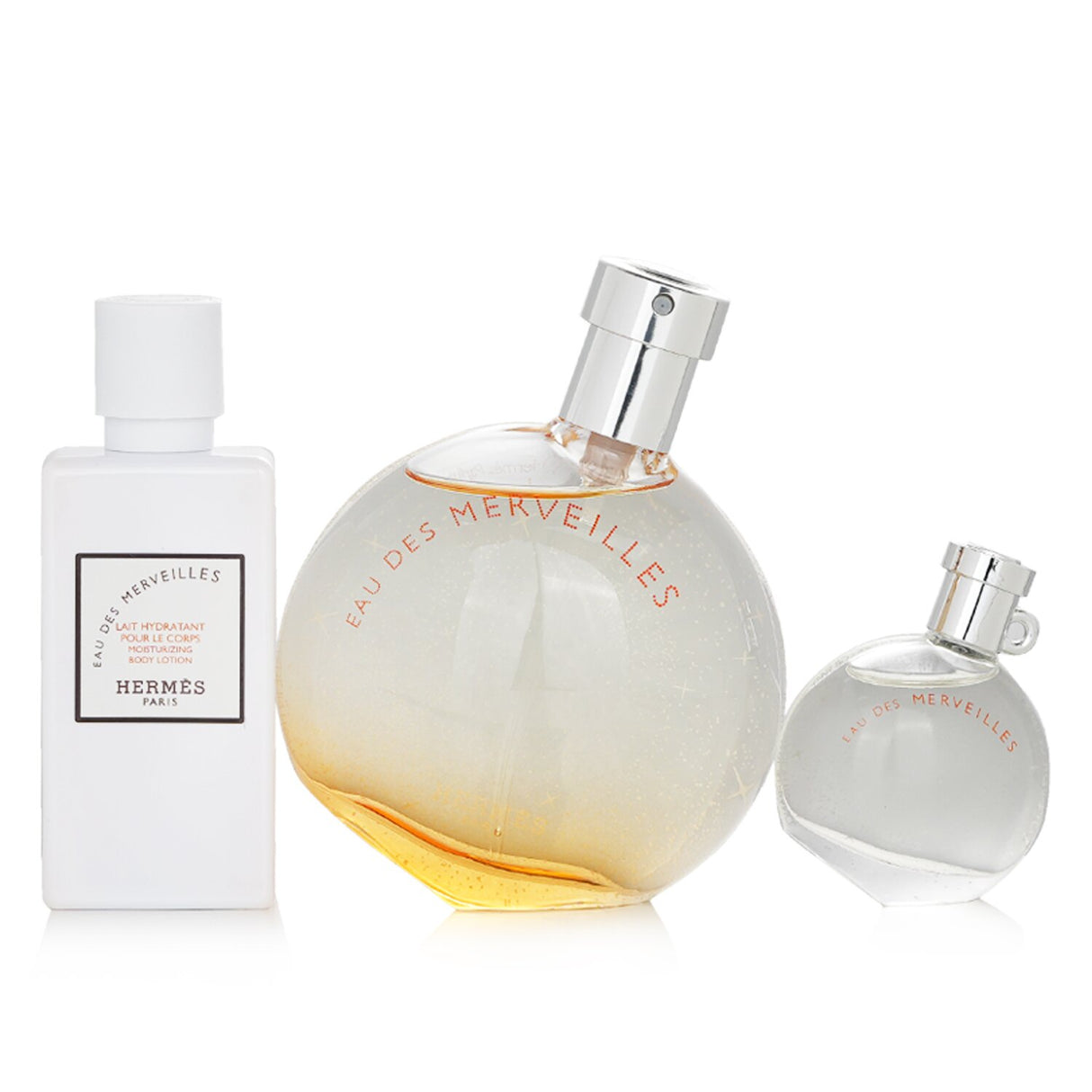 Elegant 3-piece Hermes Eau Des Merveilles Coffret featuring 50ml EDT, 40ml body lotion, and 7.5ml miniature spray.