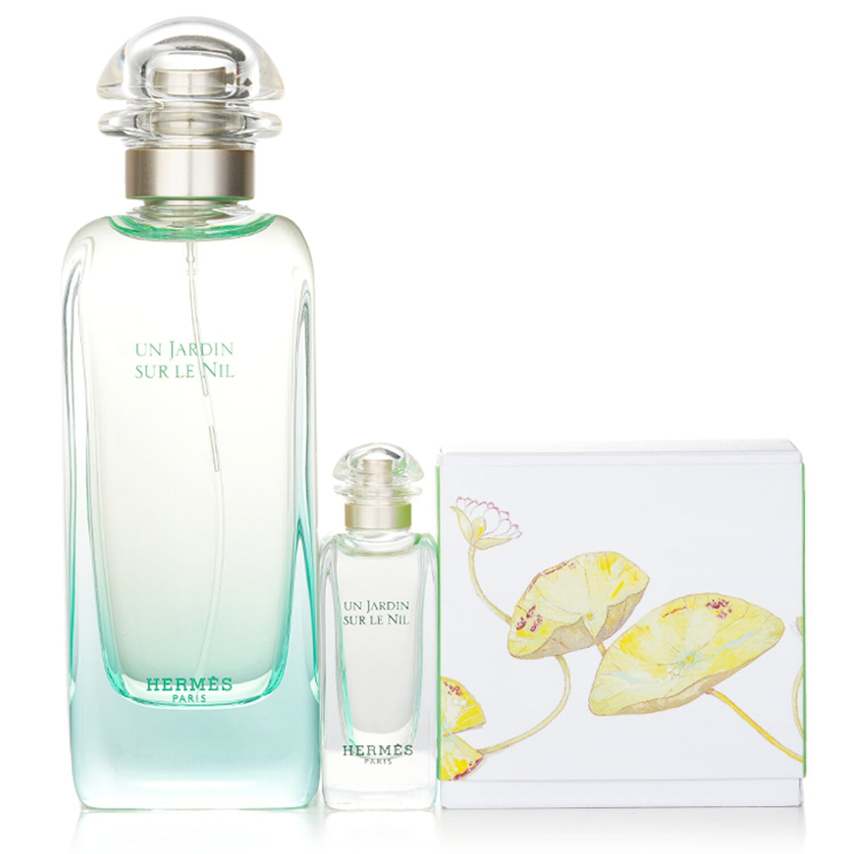 Luxury 3-piece Hermes Un Jardin Sur Le Nil set with full-sized fragrance, miniature, and perfumed soap, evoking a serene oasis.