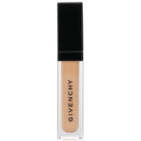 Givenchy Prisme Libre Skin Caring Concealer in shade #N312, featuring 95% natural ingredients for flawless, radiant coverage.