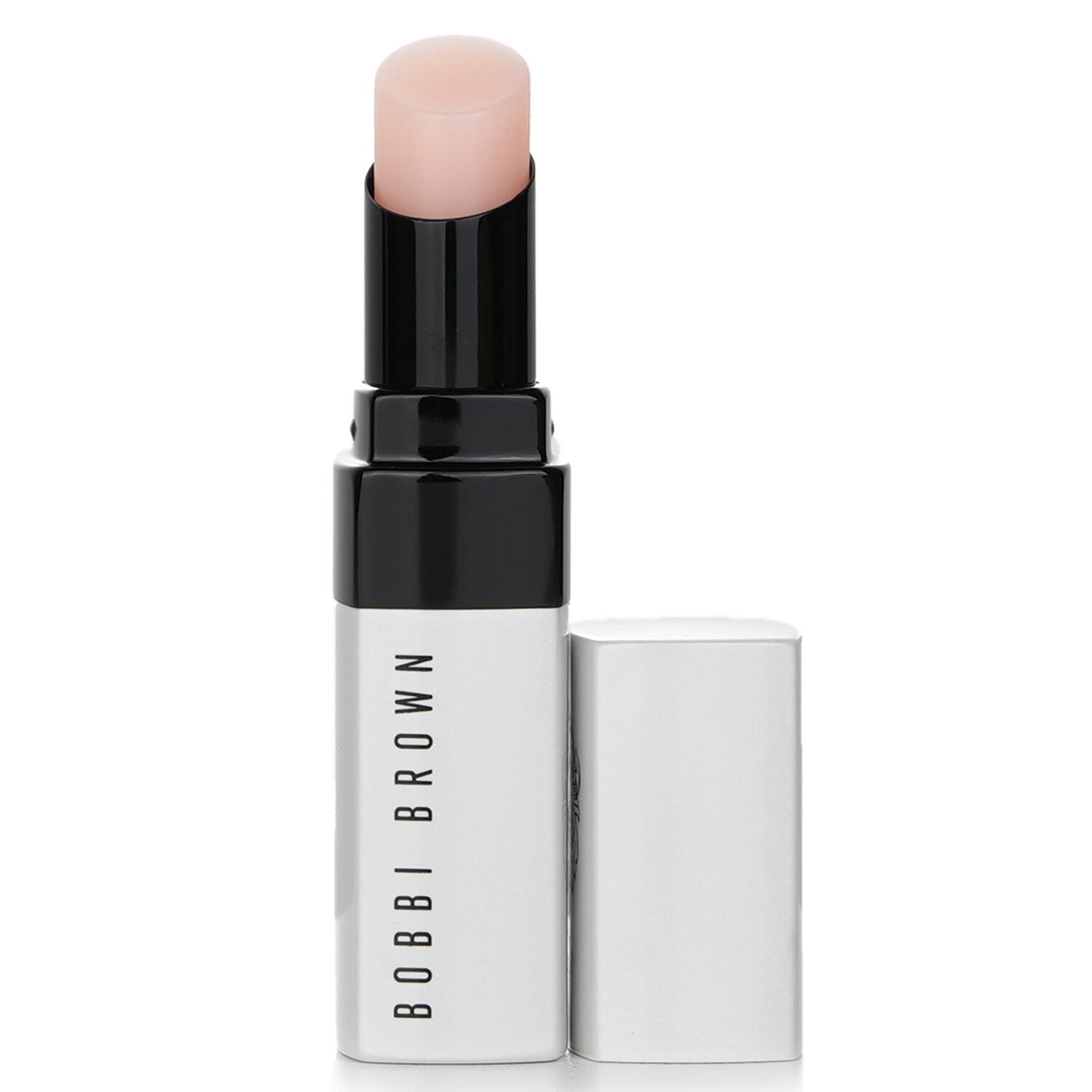 Bobbi Brown Extra Lip Tint #338 Bare Pink, a sheer, hydrating balm-lipstick for personalized, vibrant lip color.