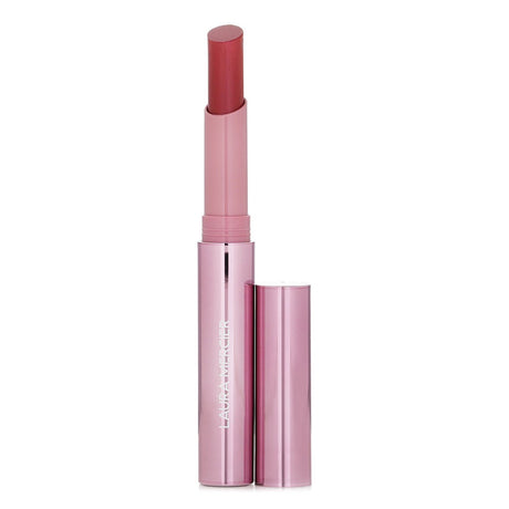 Vivid #180 Burst lip color by Laura Mercier, infused with Guava oil for long-lasting hydration and bold, vibrant finish.