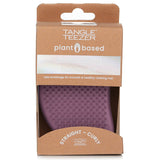 Eco-friendly Tangle Teezer hairbrush in Earth Purple, designed with two-tiered teeth for effortless detangling of all hair types.