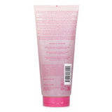 Luxurious pink jelly body scrub with quartz and argan for radiant, smooth skin, infused with jasmine and musk fragrance.