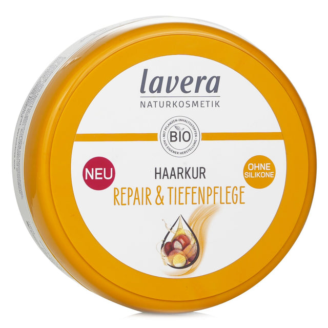 Vegan hair treatment for damaged hair, enriched with macadamia and argan oils for deep repair and nourishment.