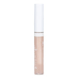 Lavera Juicy Lips Oil in peach and coconut, a non-sticky formula for glossy, hydrated, and soft lips.