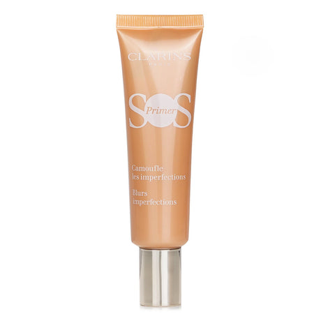 Lightweight oil-free peach primer by Clarins, enhances skin radiance, hydrates for 24 hours, and preps for flawless makeup.