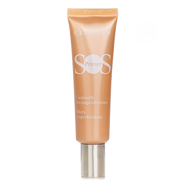 Lightweight oil-free peach primer by Clarins, enhances skin radiance, hydrates for 24 hours, and preps for flawless makeup.
