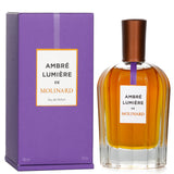 Molinard Ambre Lumiere Eau De Parfum Spray in a sleek 90ml bottle, featuring a captivating amber and floral perfume blend.